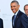 United Nations Secretary General Ban Ki-moon shakes hands with President Barack Obama as French president Francois Hollande looks on as Obama arrives for the opening of the UN conference on climate change. (Photo: WostokPress/MaxPPP/Newscom)