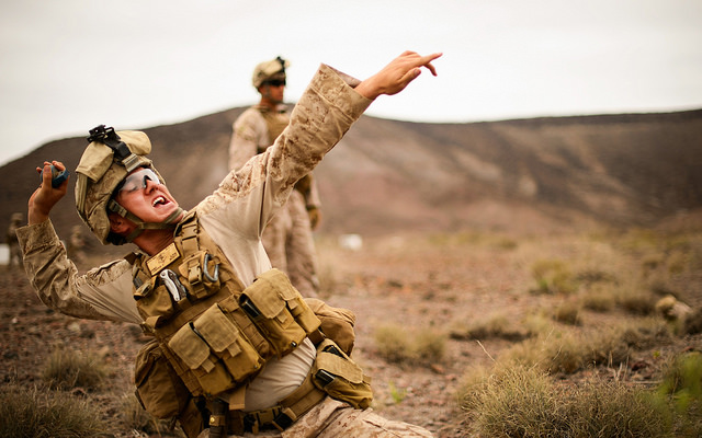 A U.S. Marine with the 13th Marine Expeditionary Unit (MEU), Battalion Landing Team, Alpha Company 1/4, throws a training grenade during a live fire and movement grenade training exercise at Arta Range, Djibou. (Photo: Staff Sgt. Staci Miller/Released)