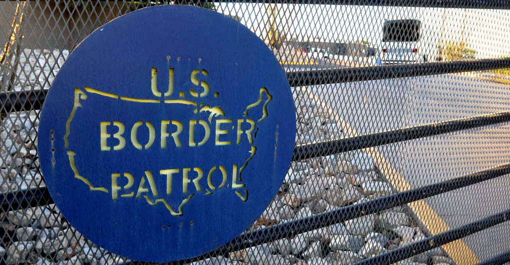 A Border Patrol sign on a fence in the border town of Nogales in Santa Cruz County, Ariz. (Photo: Newscom)