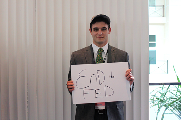 Mike Battey, 21, cares most about ending the Federal Reserve. (Photo: Kelsey Harris)