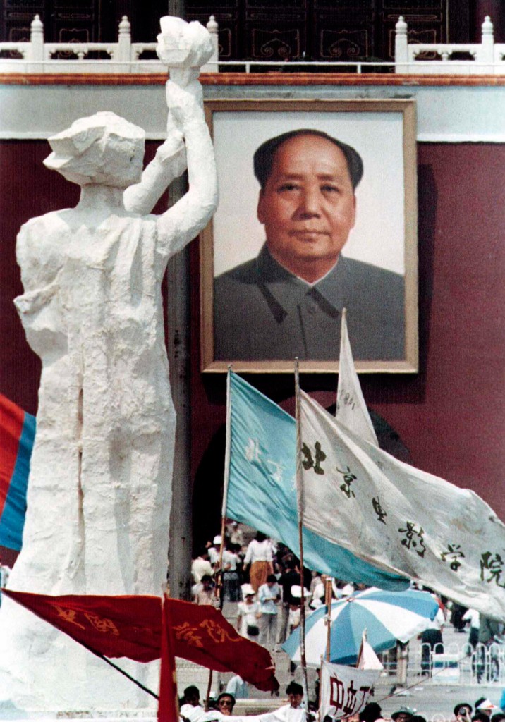 A portrait of China's late chairman Mao Zedong overlooks the "Goddess of Democracy," modeled after the Statue of Liberty, in Beijing's Tiananmen Square in this June 1989 photo. (Photo: STRINGER/CHINA/REUTERS/Newscom)