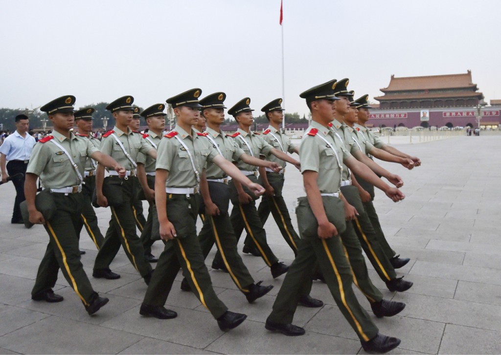 Armed police officers march at Tiananmen Square in Beijing on June 4, 2015, the 26th anniversary of the bloody crackdown on pro-democracy demonstrators. (Photo: Kyodo/Newscom)