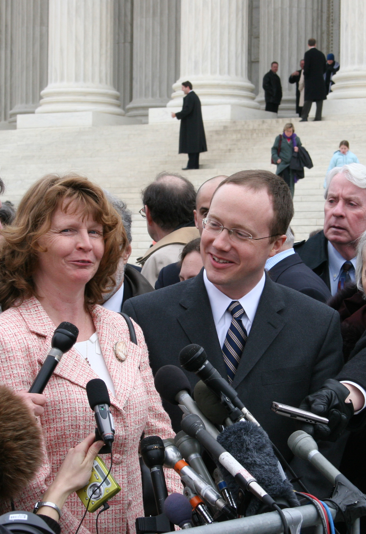 Susette Kelo and Institute for Justice lawyer Scott Bullock stand outside the Supreme Court after oral arguments in the case Kelo v. City of New London. (Photo: Institute for Justice)