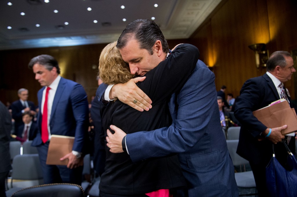 Sen. Ted Cruz, R-Texas, hugs Laura Wilkerson, whose son Josh was burned to death by his classmate who was in the U.S. illegally after offering to give him a ride home from school. Wilkerson testified during a Senate Judiciary Committee hearing July 21, 2015. (Photo: Tom Williams/CQ Roll Call/Newscom)