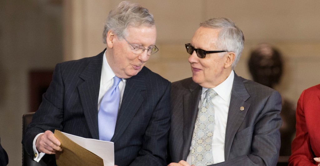 Senate Majority Leader Mitch McConnell, R-Ky., and Minority Leader Harry Reid, D-Nev., at a congressional ceremony in May. (Photo: Michael Reynolds/EPA/Newscom)