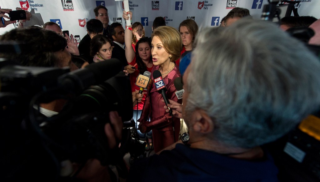 Former Hewlett Packard chief executive Carly Fiorina speaks with the media in the spin room. (Photo: Brian Cahn/ZUMA Press/Newscom)