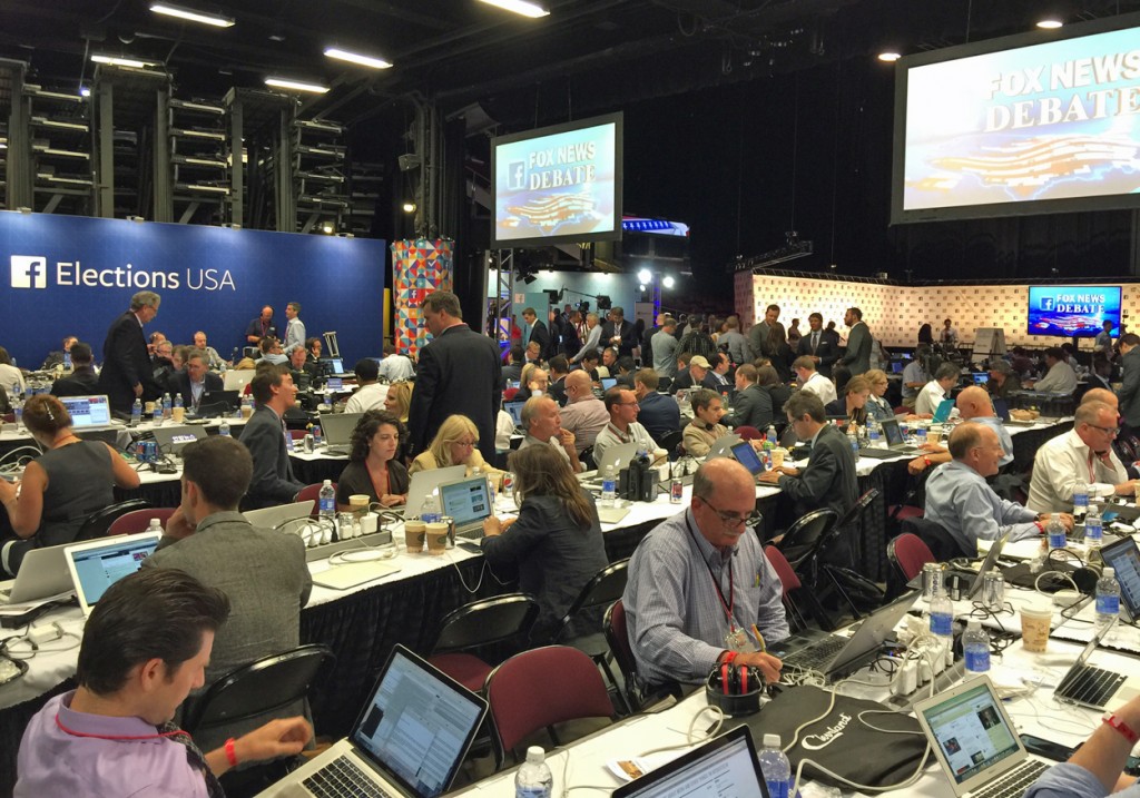 Reporters in the media filing center. (Photo: Rob Bluey/The Daily Signal)