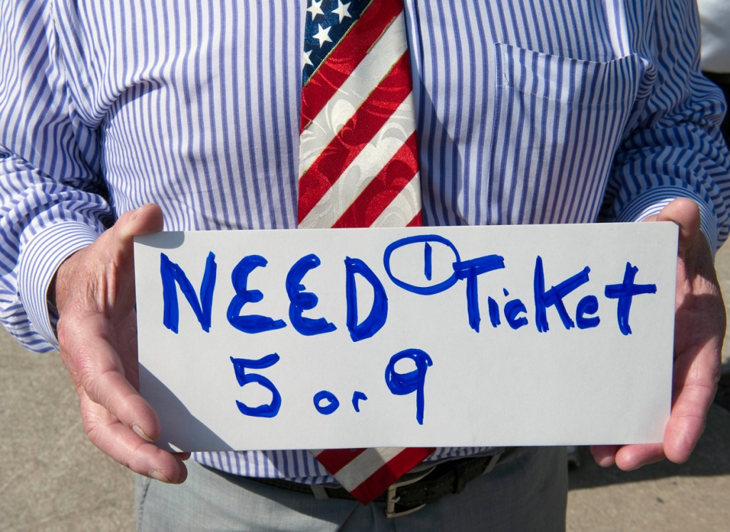 A man seeks a ticket outside the Quicken Loans Arena to attend the Republican presidential debate. (Photo: Brian Cahn/ZUMA Press/Newscom)
