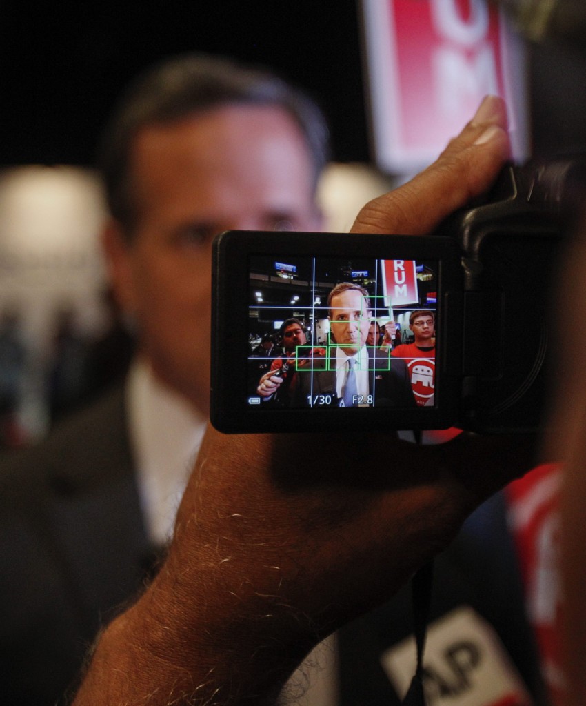 Former Sen. Rick Santorum of Pennsylvania answers questions in the spin room following the first Republican presidential forum at Quicken Loans Arena. (Photo: David Maxwell/EPA/Newscom)
