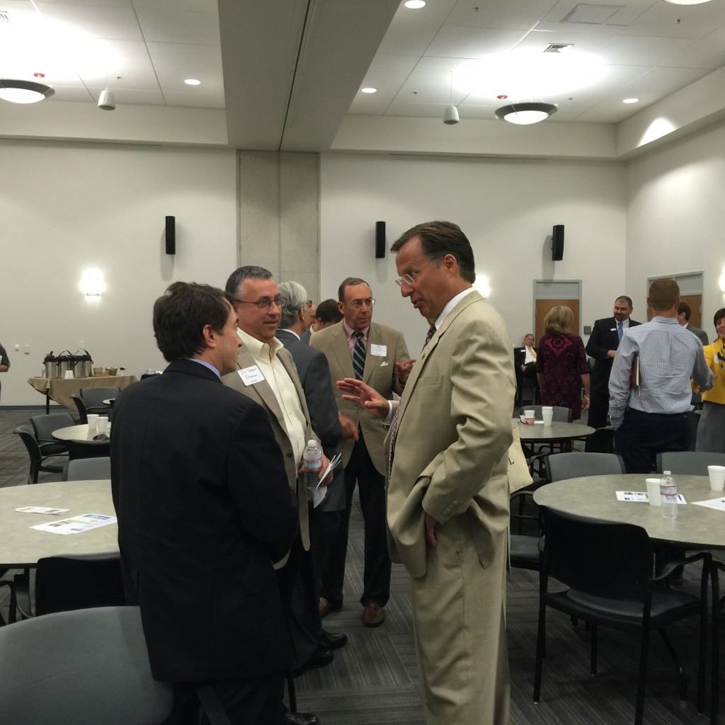 Rep. Dave Brat talks with business owners at a breakfast for the Henrico Business Council of the Greater Richmond Chamber. (Photo: Melissa Quinn/The Daily Signal)
