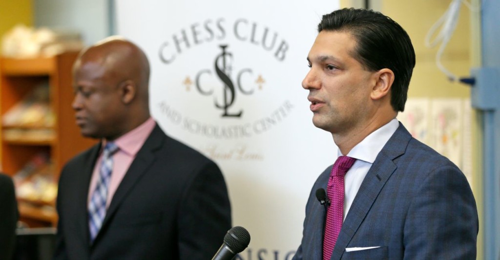 Nick Ragone (right) announces a partnership between Ascension and the Chess Club and Scholastic Center of St. Louis at Walnut Grove Elementary in Ferguson. (Photo: Ascension)