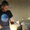 In a pro-America style choice, a Ukrainian soldier on the front line wears a T-shirt from the Ronald Reagan Presidential Library. (Photo: Nolan Peterson/The Daily Signal)