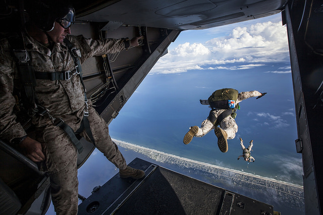 Force Reconnaissance Marines with the Maritime Raid Force, 24th Marine Expeditionary Unit perform a diving exit while conducting an initial High Altitude Low Opening jump out of a MV-22B Osprey. (Photo: Cpl. Todd F. Michalek/ Released)