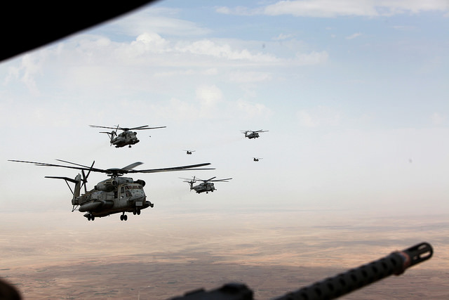 Marine Corps and Royal Air Force helicopters fly in formation after departing Camp Bastion, Afghanistan. (Photo: Staff Sgt. John Jackson/Released)