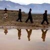 Displaced Afghan children play near a temporary shelter on the outskirts of Herat, Afghanistan, Jan. 6. (Photo: Jalil Rezayee/EPA/Newscom)