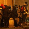Migrants from Syria, Iraq and Afghanistan huddle outside a police station Wednesday in Belgrade, Serbia. “With our national security at risk, Congress has a duty to ensure a thorough and transparent vetting program,” Heritage Action CEO Mike Needham says. (Photo: Koca Sulejmanovic/ EPA/ Newscom)