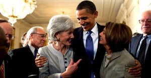President Barack Obama on March 23, 2010 with Secretary of Health and Human Services Kathleen Sebelius and House Speaker Nancy Pelosi after signing the Affordable Care Act. (Photo: Pete Souza/ZUMA Press/Newscom)