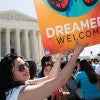 Demonstrators gather outside the U.S. Supreme Court during oral arguments challenging President Obama's immigration actions. (Photo: Jeff Malet/Newscom)