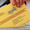 Wisconsin's voter ID law will remain in place for the November election because a district court judge stayed his earlier ruling against the law on Aug. 11. (Photo: Mike Blake
/Reuters/Newscom)