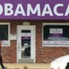 An Orlando man walks by a local Affordable Care Act enrollment center on May 19. (Photo: Paul Hennessy/Polaris/Newscom)