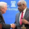 Supreme Court Justice Clarence Thomas accepts The Heritage Foundation’s Defender of the Constitution Award on Oct. 26 from Heritage scholar and former Attorney General Edwin Meese III. (Photo: Willis Bretz for The Daily Signal)