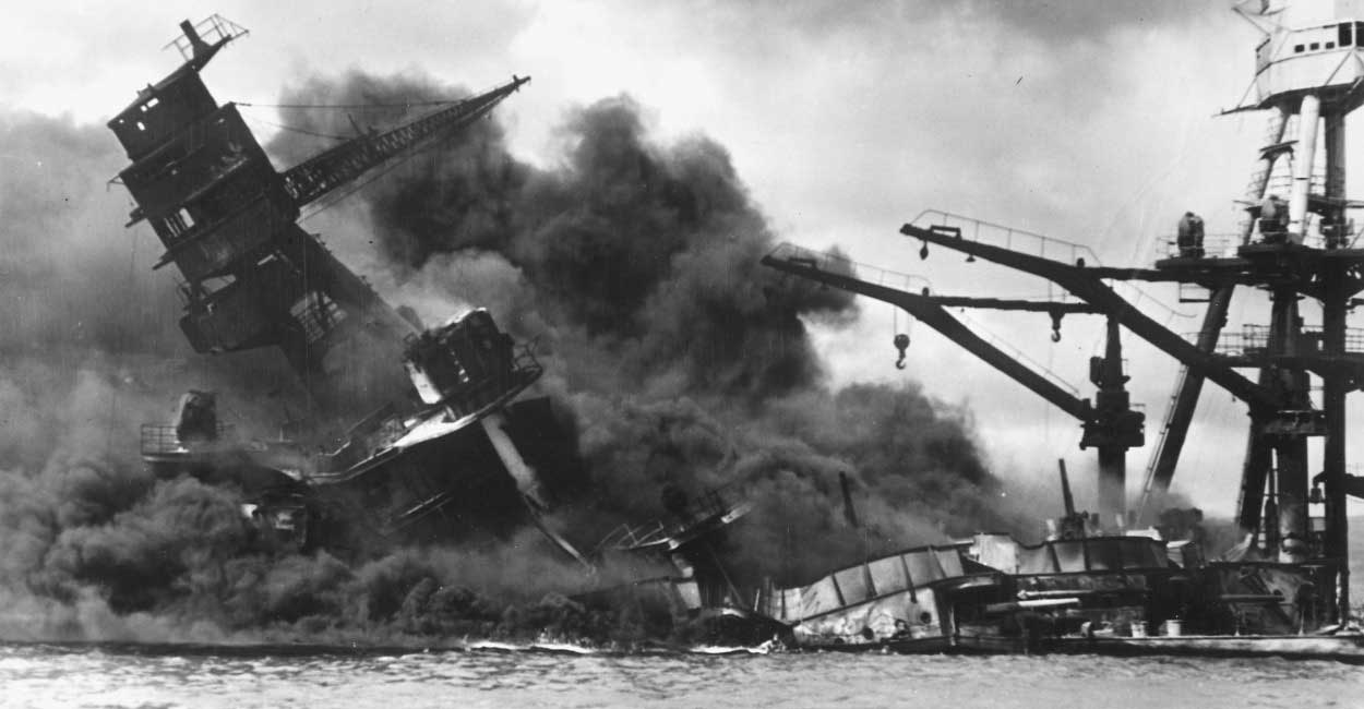 The battleship USS Arizona sinks after being hit by a Japanese attack on Pearl Harbor. (Photo: Handout/Reuters/Newscom)