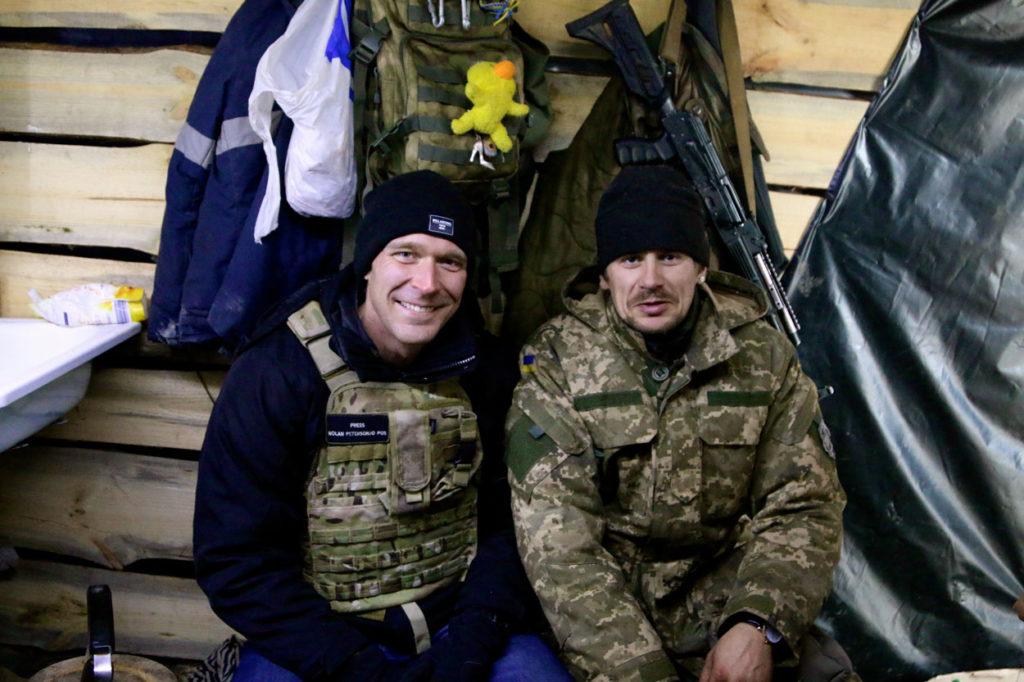 The author, left, on the front lines in eastern Ukraine. (Photo: Nolan Peterson/The Daily Signal)