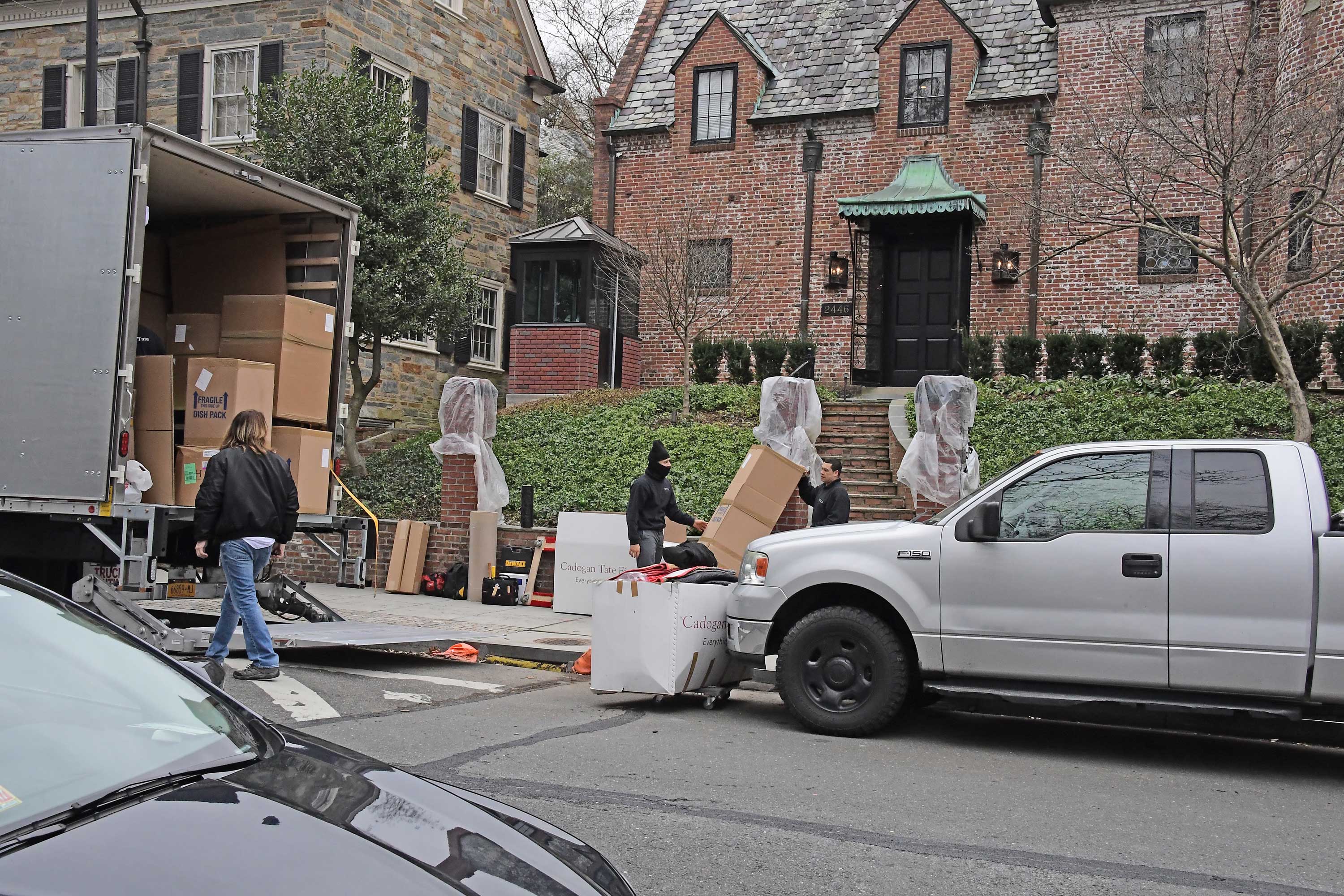 Movers take boxes from a truck to 2446 Belmont Road, NW in Washington, D.C. the home that President Barack Obama and his family will be living after he departs the White House Friday. (Photo: Ron Sachs/CNP/Polaris/Newscom) 