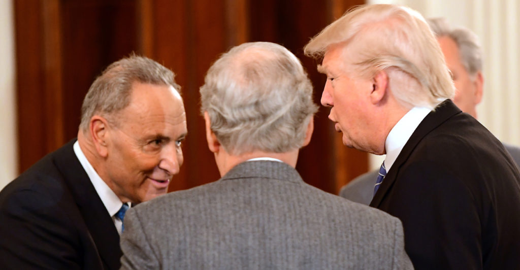 President Donald Trump welcomes Senate Minority Leader Chuck Schumer, D-N.Y., and Senate Majority Leader Mitch McConnell, R-Ky., to the White House. (Photo: Ron Sachs/ZUMA Press/Newscom)
