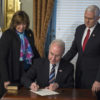 Tom Price signs the official forms after being sworn in by Vice President Mike Pence as the health and human services secretary in the vice president's Ceremonial Office in the EEOB next to the White House. (Photo: Pat Benic/UPI/Newscom)