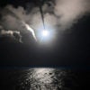 The USS Porter in the Mediterranean Sea launches Tomahawk cruise missiles at the Shayrat air base in Syria, April 7, 2017. (Photo: Ford Williams
/Zuma Press/Newscom)
