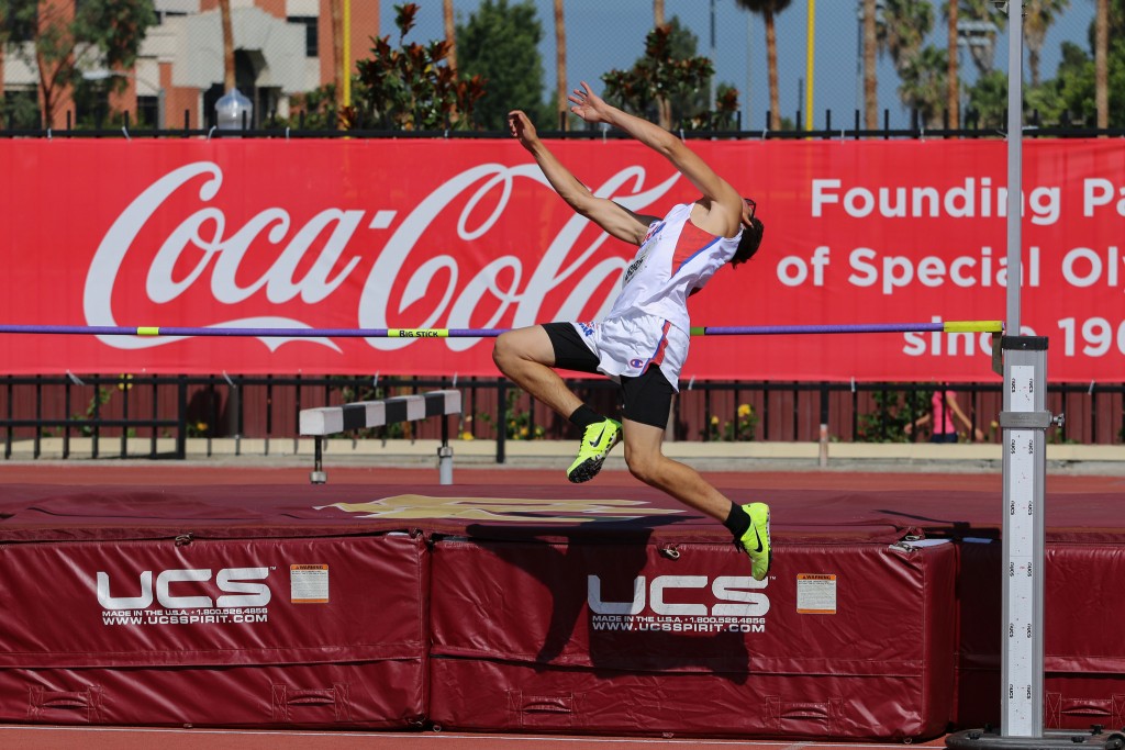 A man throws himself over the hurdle in the high jump event. (Photo: Flickr/SpecialOlympicsUSA)