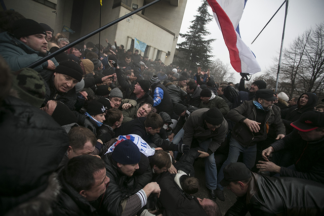 Thousands of pro-Russia separatists tussled with supporters of Ukraine's new leaders in Crimea on Wednesday as tempers boiled over the future of the region. (Photo: REUTERS/Baz Ratner/Newscom)