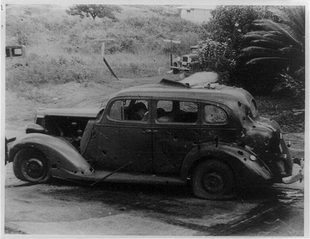 Three civilians were killed in this shrapnel-riddled car by a bomb dropped from a Japanese plane eight miles from Pearl Harbor. (Photo: Library of Congress Prints and Photographs)