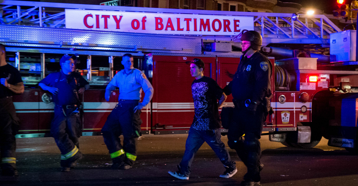 A protestor is arrested at Pennsylvania and North Avenues in Baltimore. (Photo: UPI/Newscom)