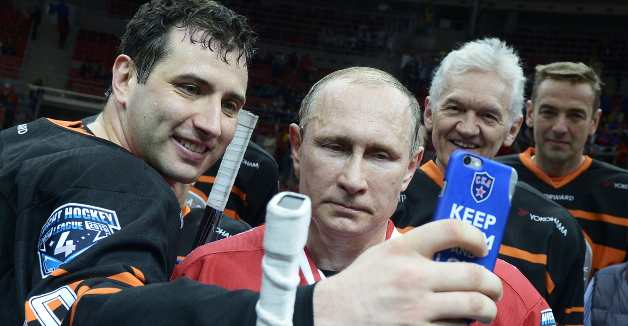 Vladimir Putin poses for a selfie. (Photo: Nikolsky Alexei/ZUMA Press/Newscom)