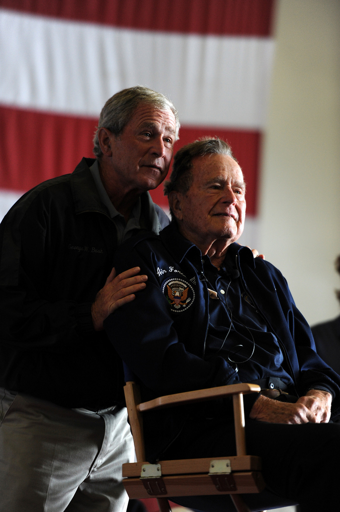 Former Presidents George H.W. Bush and George W. Bush deliver remarks to the crew during a ceremony aboard the aircraft carrier USS George H.W. Bush. (Photo: Official U.S. Navy Page)