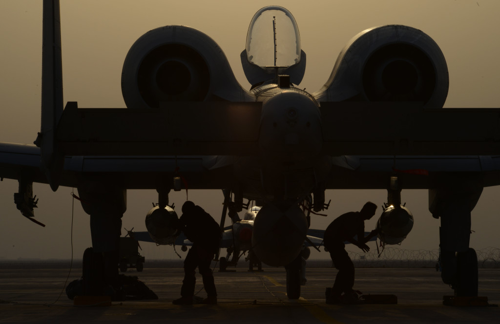 U.S. Air Force airmen work on an A-10 Thunderbolt II from the 163rd Expeditionary Fighter Squadron. Since their arrival to the 332nd Air Expeditionary Group, A-10s have expended nearly 50,000 rounds of ammunition and dropped approximately 500 bombs and maverick missiles in support of Operation Inherent Resolve. (Photo: Tech. Sgt. Jared Marquis/U.S. Air Force)
