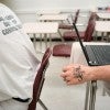 Inmates at Alabama Therapeutic Education Facility prepare to take their GED test. The privately-run prison aims to “break the cycle of recidivism.” (Photo: Bob Miller for The Daily Signal)