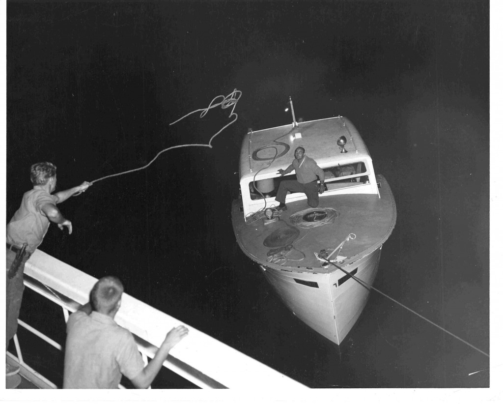 The U.S. Coast Guard answers the distress signal of a Cuban speed boat and tows it to the Keys in November 1965. (Photo: U.S. Coast Guard Camarioca Boatlift Collection) 