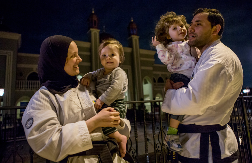 Alyssa Alfaleet (left) married her husband, Raed, and converted to Islam. The couple is raising their two children to be accepting of other religions. (Photo: Scott Dalton)