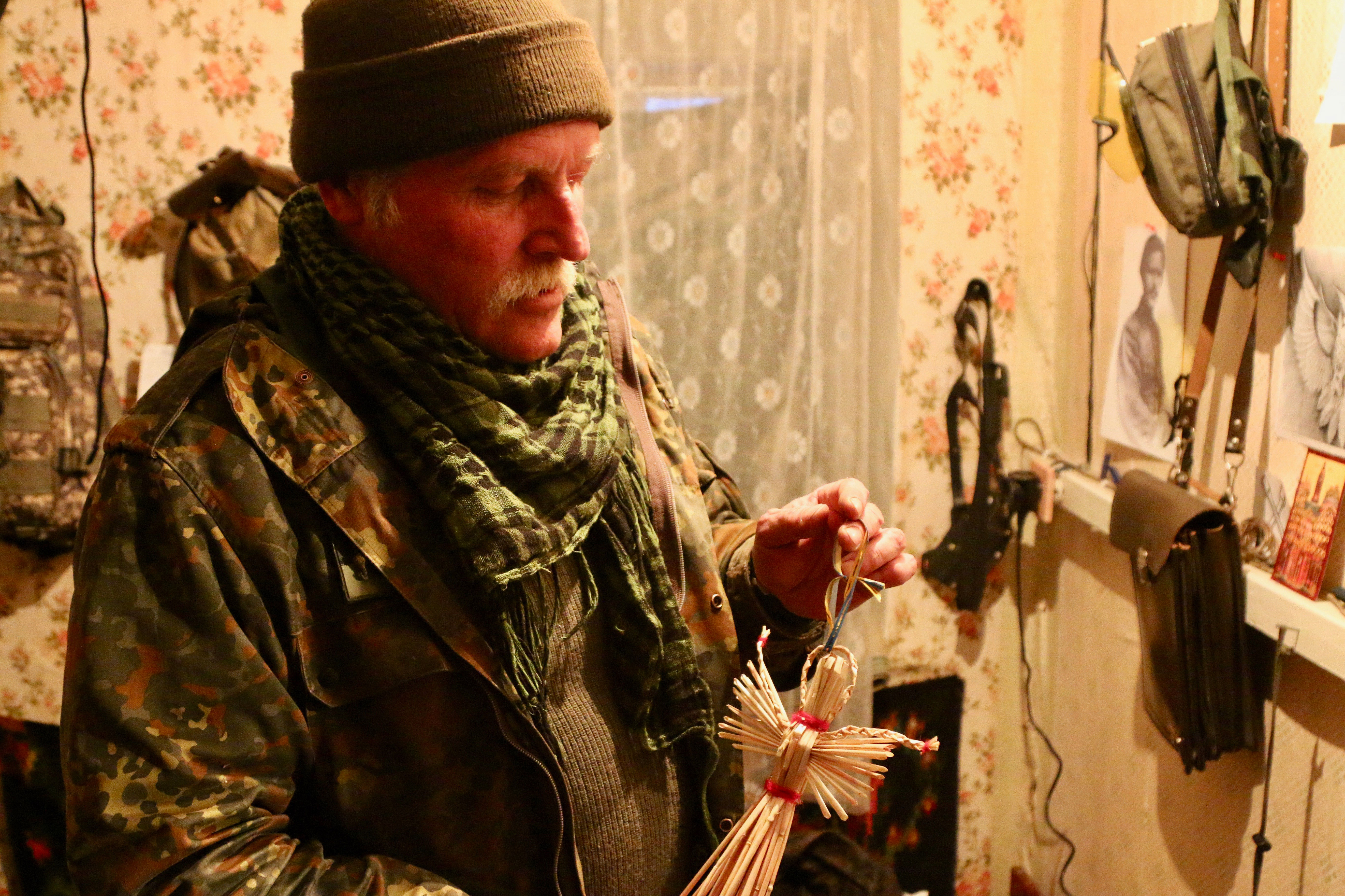 Ukrainian soldier Oleksandr Derevyanko, 54, inside a forward outpost in Taramchuk, Ukraine.