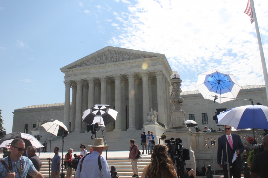News stations begin to set up waiting for a Supreme Court decision. (Photo: Samantha Reinis/The Daily Signal)