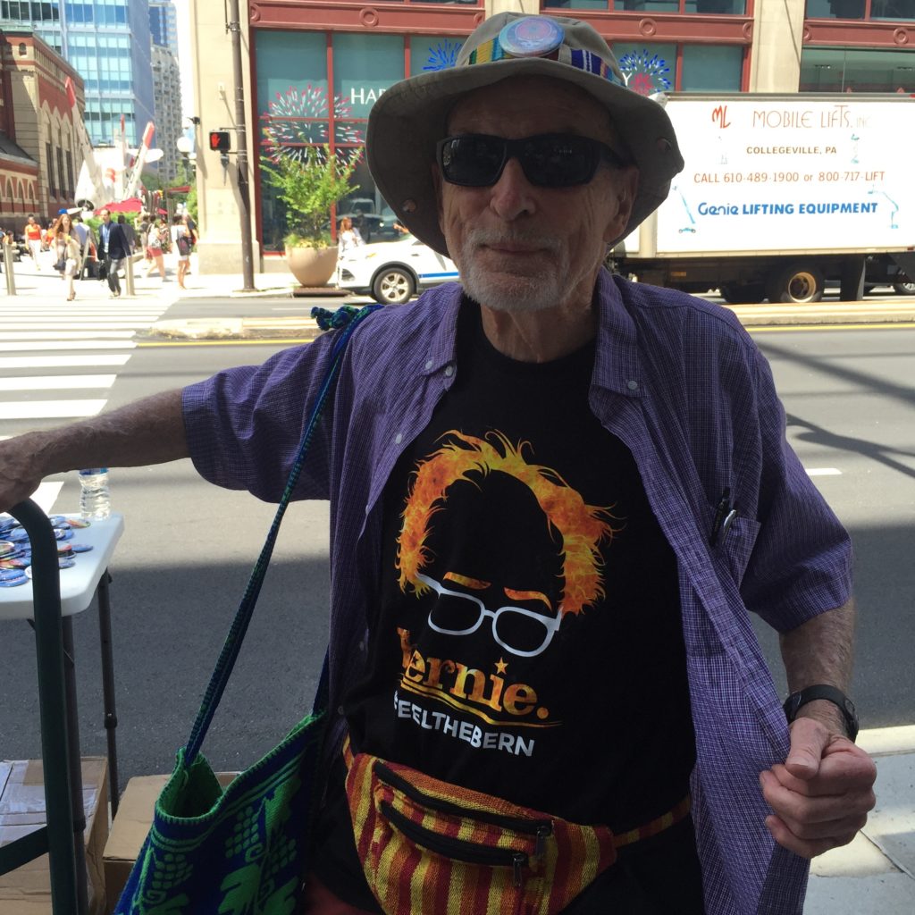 Outside the convention center, Cliff Barney, 86, sells t-shirts he helped create. (Photo: Josh Siegel/The Daily Signal)