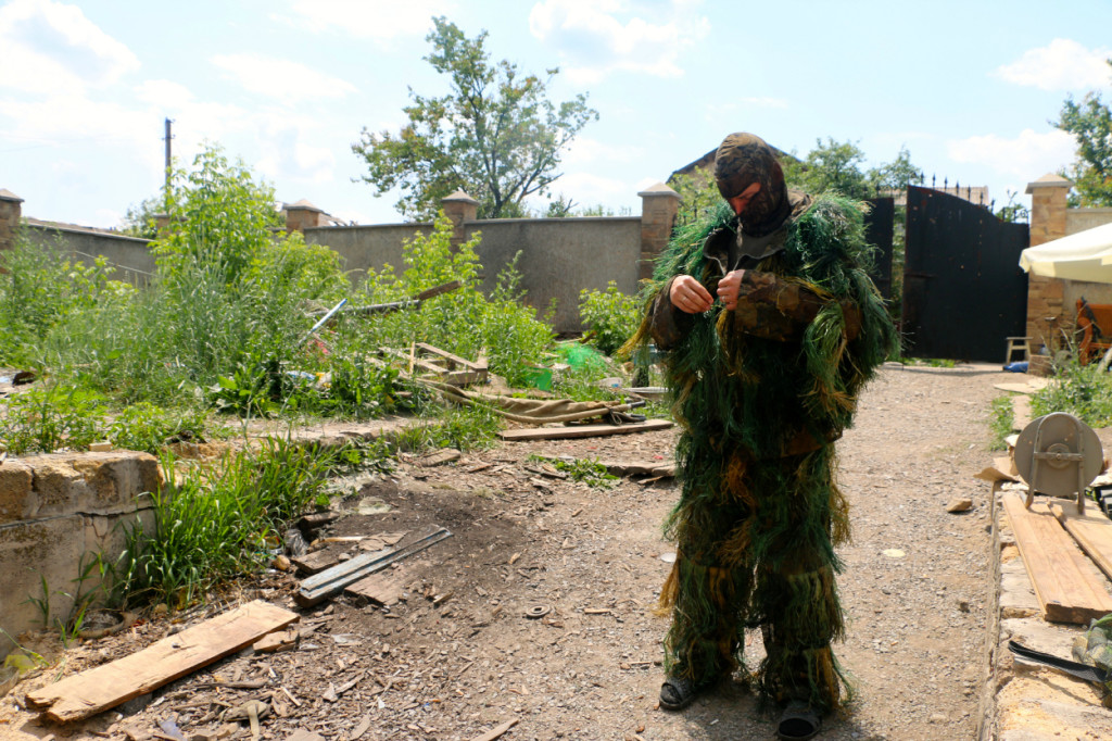 Volodymyr, a Ukrainian sniper, preparing for a mission in Pisky. (Photo: Nolan Peterson/The Daily Signal)