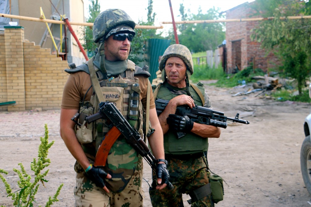 Vasiliy Ivaskiv, 53, (right), and another soldier on patrol in Pisky. (Photo: Nolan Peterson/The Daily Signal)