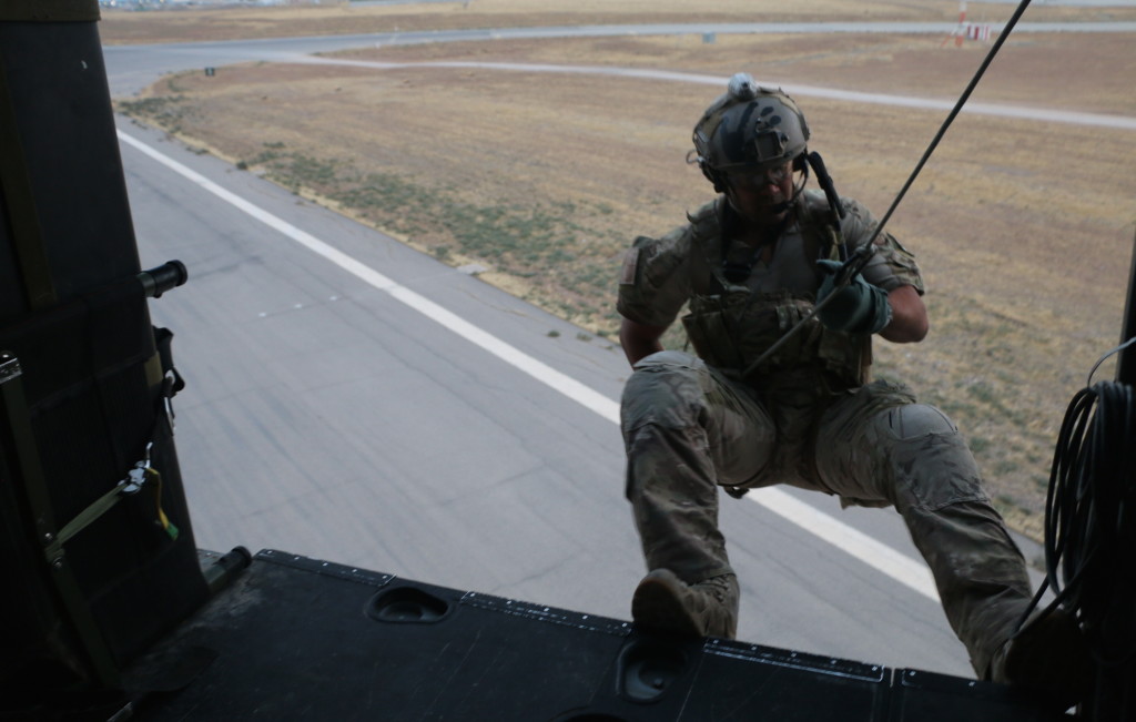 An Air Force pararescueman rappels out of a helicopter in Iraq. (Photo: Nolan Peterson/The Daily Signal)