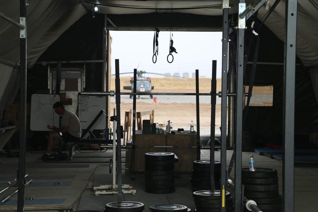 Troops spend down time working out in an improvised gym. (Photo: Nolan Peterson/The Daily Signal)