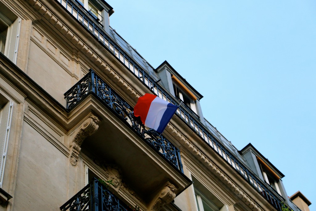 Many Parisians have displayed the French flag as a sign of national unity. (Photo: Nolan Peterson/The Daily Signal)