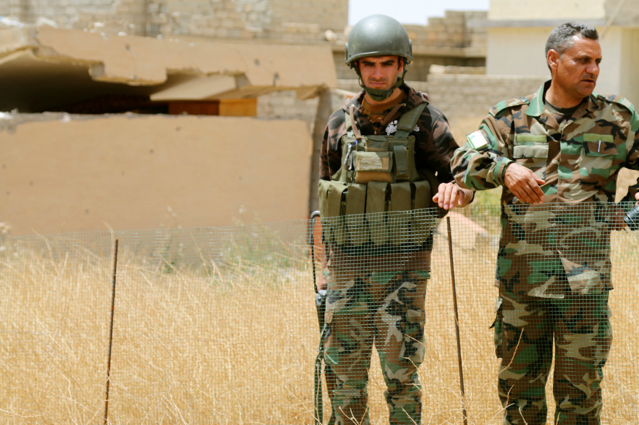 Even battle-hardened peshmerga soldiers seem affected by the mass graves in Sinjar.